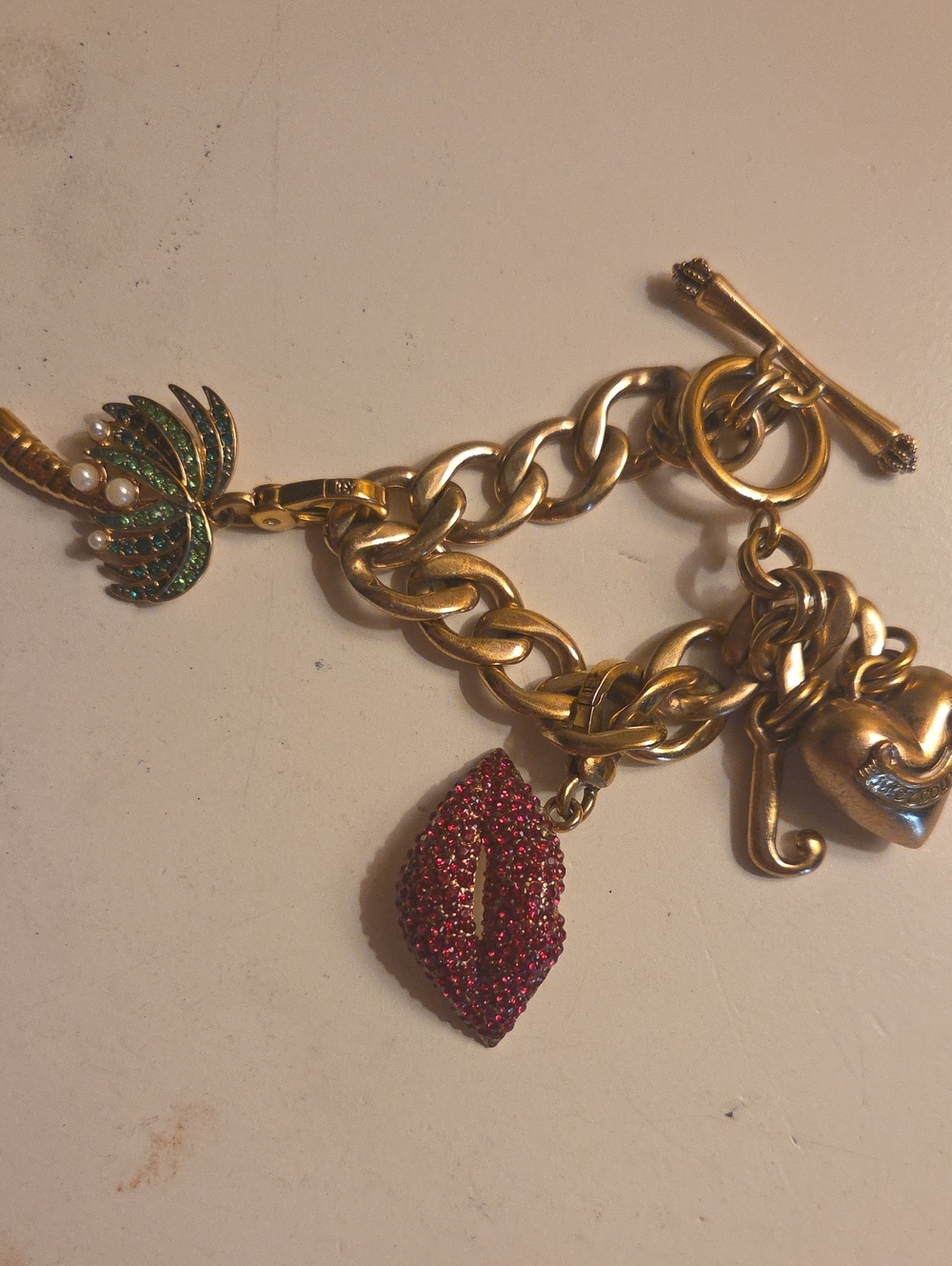 Juicy Couture Gold Charm Bracelet W/ 2 Charms